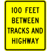 XXX Feet Between Tracks And Highway sign